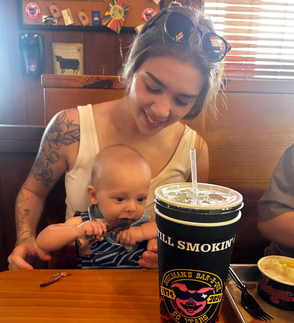 Soulmans customers baby eating bbq