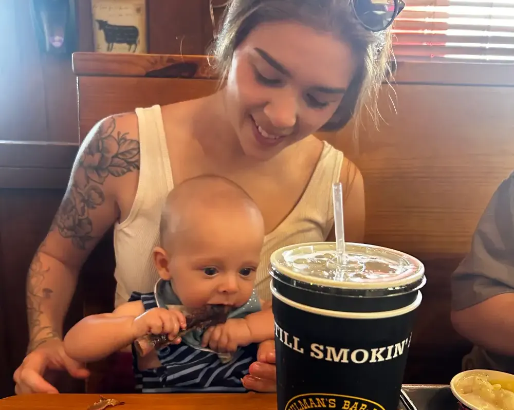 Soulmans customers baby eating bbq